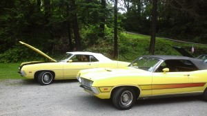 2 yellow convertibles  